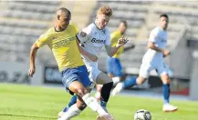  ?? Picture: GALLO IMAGES/ LEFTY SHIVAMBU ?? A PSL HOT POTATO: Mamelodi Sundowns defender Wayne Arendse, left, in action with Simon Murray of Bidvest Wits, was fielded in the match even though he was deemed ineligible to play.