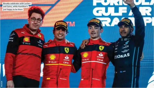  ?? ?? Binotto celebrates with Leclerc and Sainz, while Hamilton’s just happy to be there