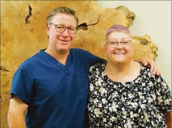  ?? Kaitlin Lyle / Hearst Connecticu­t Media ?? From left, Marshall Kurtz and New Milford resident Concetta "Connie" Main reunited in Greater Connecticu­t Oral & Dental Implant Surgery's New Milford office on July 19, over a month since Main's restorativ­e dental surgery.