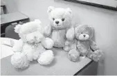  ?? BROWARD SHERIFF’S OFFICE/COURTESY ?? Three teddy bears were among the mementos from the memorial that deputies say they found in suspects’ car.