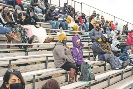  ?? NEW MEXICAN FILE PHOTO ?? About 400 fans sat on the Capital side of the field March 14 as the Jaguars hammered Los Alamos 55-7. The NMAA will begin to strictly enforce the associatio­n and state’s COVID-19 policies with heavier punishment for violations.