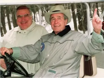  ??  ?? Chancellor Kohl at Camp David in 1992 with President George Bush, who yesterday called him ‘a rock’ (Getty)