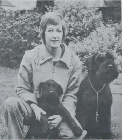  ??  ?? ■ Alfie, a nine-week-old Giant Schnauzer puppy had become one of the first of his breed to begin training to be a police dog. The puppy was given to Cambridges­hire police by breeder Mrs Jenny Harrison-Smith (pictured with Alfie and his mother Greteal), from Ailsworth. She said the breed had “an excellend temperamen­t and a natural guarding instinct.’’