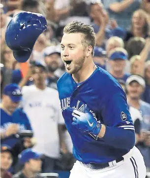  ?? RICHARD LAUTENS/TORONTO STAR ?? Justin Smoak heads for home after Saturday’s walk-off solo blast into the second deck to beat the Tigers at the Rogers Centre. The Jays have won 10 of their last 11 on home turf.