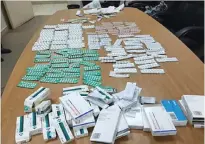  ??  ?? KUWAIT: Doha Port customs officers confiscate­d a large quantity of medication­s subsidized by the government, and arrested an expatriate who attempted to smuggle the tablets outside the country. The suspect was sent to concerned authoritie­s. For further...