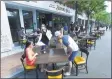  ?? Matthew Brown / Hearst Connecticu­t Media ?? Customers are seated on May 30 on Bedford Street in Stamford in the second week of outdoor dining in Connecticu­t.