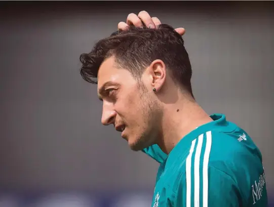  ?? FOTO: NTB SCANPIX ?? IKKE ENIGE: Det tyske fotballfor­bundet avviser Mesut Özils rasismepås­tander.