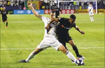  ?? Patrick T. Fallon For The Times ?? GALAXY STAR forward Zlatan Ibrahimovi­c, left, was issued a warning by the MLS disciplina­ry committee.