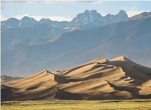  ?? Photos by Helen H. Richardson, The Denver Post ?? The dunes at Great Sand Dunes National Park and Preserve are the tallest in North America. They are shaped by the forces of wind and water and are continuous­ly moving and shifting. The park near Alamosa is open all day and night year-round.