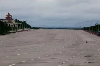  ??  ?? ABOVE:
Ballardian vistas; an empty 20-lane motorway in Naypyitaw.
BELOW: