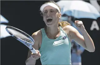  ?? DITA ALANGKARA — THE ASSOCIATED PRESS ?? Belgium’s Elise Mertens celebrates after defeating Ukraine’s Elina Svitolina in their quarterfin­al at the Australian Open.