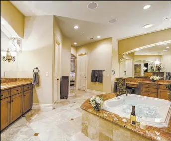  ??  ?? The master bath.