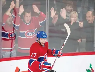  ?? DARIO AYALA/THE GAZETTE ?? Fans cheer after a goal by Alex Galchenyuk in 2013. New research suggests that viewing a hockey game can be a source of an intense emotional stress manifested by marked increases in heart rate.