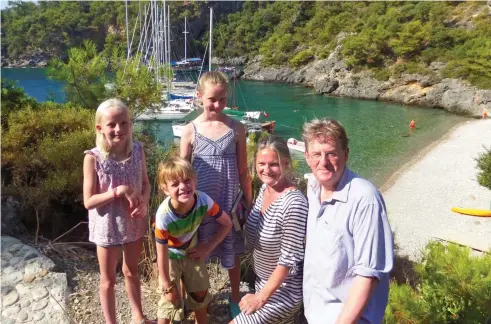  ??  ?? Shipshape: Robert Hardman and his family in Turkey’s Cold Water Bay on the glorious Turquoise Coast
