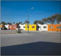  ?? AP/REBECCA BLACKWELL ?? Newly constructe­d homes wait for owners in a gated community outside San Luis Potosi, Mexico. The Mexican auto boom has failed to create a thriving middle class.
