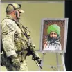  ?? Picture: EPA ?? HIGH SECURITY: Heavily armed police secure art work before Dutch MP Geert Wilders delivered the keynote address