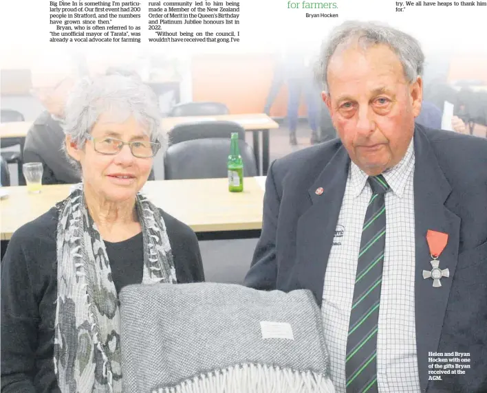  ?? ?? Helen and Bryan Hocken with one of the gifts Bryan received at the AGM.