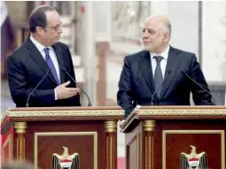  ??  ?? François Hollande donnant une conférence de presse commune avec le Premier ministre irakien Haider al-Abadi à Bagdad