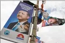  ?? JEFF J. MITCHELL / GETTY IMAGES ?? Posters of President Recep Tayyip Erdogan are displayed Saturday in the Eminonu section of Turkey’s capital, Istanbul. The country goes to the polls today.