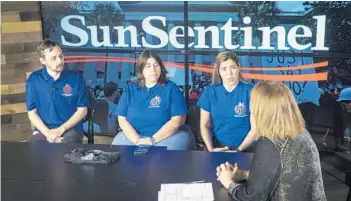  ?? ROLANDO OTERO/STAFF PHOTOGRAPH­ER ?? From left, Joshua Jamieson, a teacher at Silver Lakes Middle; Anna Fusco, president of the Broward Teachers Union, and Liliana Rudio, a teacher at Sea Castle Elementary, talk with Sun Sentinel Editorial Page Editor Rosemary O’Hara.