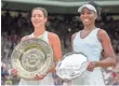  ?? SUSAN MULLANE, USA TODAY SPORTS ?? Garbine Muguruza, left, needed just 77 minutes to beat Venus Williams, right, for her first Wimbledon title.