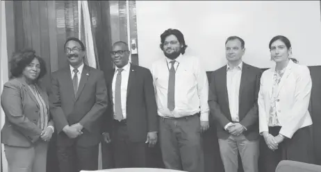  ??  ?? Attorney General Basil Williams (second from left) with members of the UN team and members of his ministry. (Attorney General’s Chambers photo)