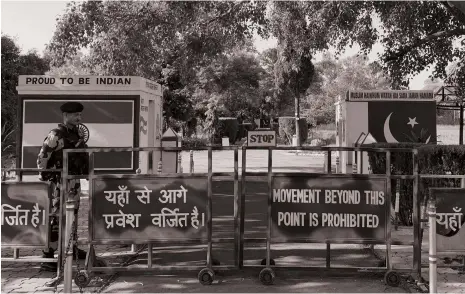  ?? Reuters ?? An Indian soldier stands guard at the country’s northern border with Pakistan, which is China’s oldest ally in the region