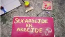  ??  ?? Sex workers are becoming increasing­ly stigmatize­d in Denmark. This sign reads: 'Sex work is also work'