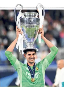  ?? GETTY IMAGES ?? Crowning glory: Thibaut Courtois celebrates with the UEFA Champions League Trophy after Real Madrid’s victory in the Champions League final match against Liverpool FC.
