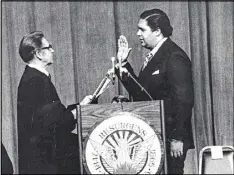  ?? AJC ARCHIVES PHOTO/CHARLES PUGH ?? Judge Luther Alverson administer­s the oath of office to Atlanta Mayor Maynard Jackson on Jan. 7, 1974.