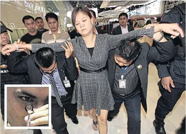  ?? PHOTOS BY PORNPROM SATRABHAYA ?? Jiang Sulian, 39, a Chinese woman who swallowed a six-carat diamond (inset), worth 10 million baht after stealing it from a jewellery fair on Thursday, at Impact Muang Thong Thani after authoritie­s retrieved the stone from her yesterday.