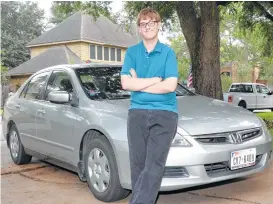  ?? Craig Moseley / Houston Chronicle ?? Parker Peddicord, 18, who has symptoms of ADHD and autism, now can drive himself to his job at a Kroger store in Katy and to therapy sessions.