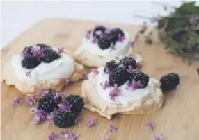  ?? Amy Brothers, The Denver Post ?? Lilac Blackberry Pavlovas made with infused lilac sugar.
