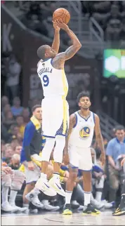  ?? NHAT V. MEYER — STAFF PHOTOGRAPH­ER ?? Andre Iguodala takes and makes a 3-point basket against the Cavaliers in the first quarter Friday.