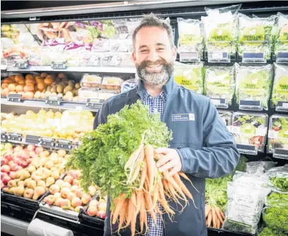  ?? Picture / Michael Craig ?? Phil Mead, owner/operator of Fresh Collective by New World, Constellat­ion Drive, says there is more emphasis on ready-to-go and fresh produce.