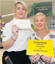  ?? 220218morr­isons_03 ?? Helping hand Morrisons’ admin manager Ashley Convery delights Monklands Women’s Aid senior business administra­tor Sasha Bennett