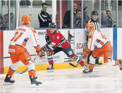  ?? Picture: Derek Black. ?? Stars’ Jordan Cownie tries to find a way through the Steelers’ defence.