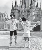  ?? CAROL AND STEVE SHOW ?? Steve and Carol Show of Port St. Lucie celebrate their 44th wedding anniversar­y at Walt Disney World’s Magic Kingdom, which reopened to the public Saturday.
