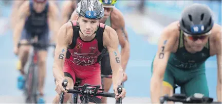  ?? GRAHAM HUGHES/THE CANADIAN PRESS ?? Noted caffeine aficionado Tyler Mislawchuk of Oak Bluff, Man., has done well enough at his events this year, such as an ITU World Triathlon Series race in Montreal in August, to be ranked eighth in the world in his discipline.