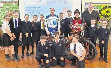  ??  ?? Kent Royals riders Rob Ledwith and Alex Spooner with pupils from Joy Lane Primary