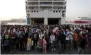  ?? Photograph: Alkis Konstantin­idis/Reuters ?? Refugees at the Greek port of Piraeus in September 2015. That year, EU nations agreed to relocate refugees from Italy and Greece as the two countries struggled with large numbers of arrivals.