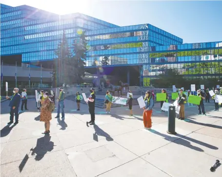  ?? GAVIN YOUNG ?? Green Line supporters rally outside city hall on Monday. The provincial and federal government­s have promised about $1.5 billion each for the Green Line. Mayor Naheed Nenshi said that’s “the largest source of dedicated funding we’ve ever had for an individual project.”