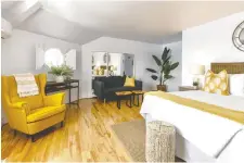  ?? HELLONORTH­STAR.CA ?? Sunny yellow accessorie­s bring some warmer flair to an otherwise wintry room.