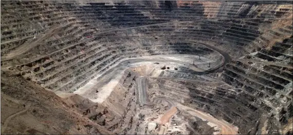  ?? ADELLA HARDING/THE DAILY FREE PRESS VIA AP ?? This undated file photo shows Barrick Goldstrike Mines’ Betze-Post open pit near Carlin, Nev.