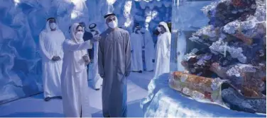  ?? WAM ?? ↑ Sheikh Khaled Bin Mohamed Bin Zayed Al Nahyan toured the new Al Qana waterside project in Abu Dhabi, including the National Aquarium.