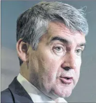  ?? THE CANADIAN PRESS/ANDREW VAUGHAN ?? Nova Scotia Premier Stephen McNeil talks with reporters at the legislatur­e in Halifax on May 31, 2017. McNeil says he fully intends to seek a third mandate as premier of the province.