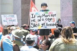  ?? FREDERIC J. BROWN/GETTY-AFP 2018 ?? Protesters decry the administra­tion's separation policy during a June rally in Los Angeles.