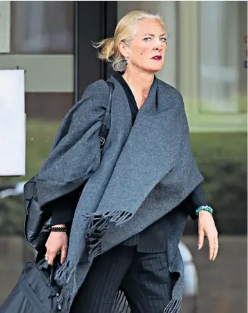  ??  ?? Simone Burns arriving at Isleworth Crown Court in London, where she pleaded guilty to assault and being drunk on an aircraft