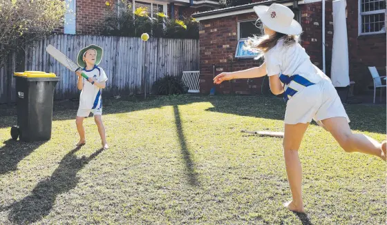  ??  ?? Daniel, 9, and Sophie Mitchell 11, who are hoping cricket season will be saved as NSW comes out of lockdown in October. Picture: Tim Hunter