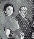  ?? ASSOCIATED PRESS ?? Ethel Rosenberg and her husband, Julius, are separated by a wire screen as they ride to jail on March 29, 1951.